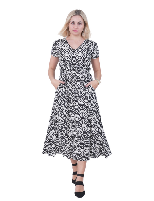 BLACK AND WHITE DRESS WITH BOW AT THE BACK